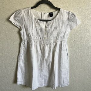 White Gap Kids shirt. Girls size XL. Button detail on front and zipper closure